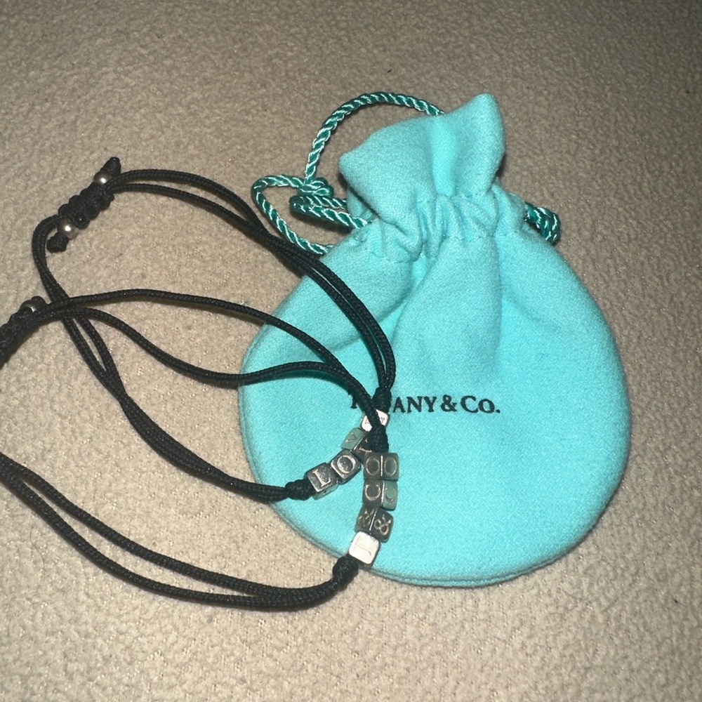 2 tiffany sterling silver black string bracelets